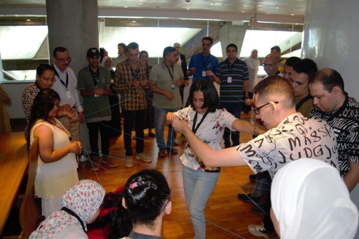 Self-advocates work through a team building exercise in Alexandria.